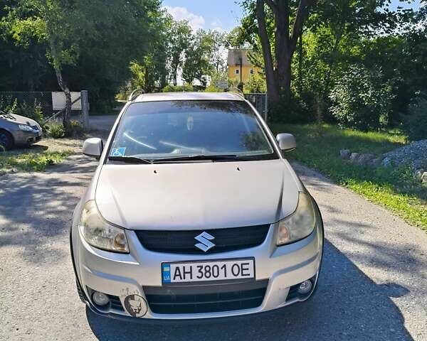 Серый Сузуки СХ4, объемом двигателя 1.6 л и пробегом 233 тыс. км за 5400 $, фото 1 на Automoto.ua