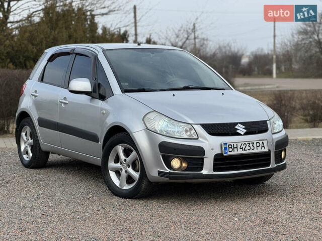 Серый Сузуки СХ4, объемом двигателя 1.59 л и пробегом 120 тыс. км за 5900 $, фото 1 на Automoto.ua