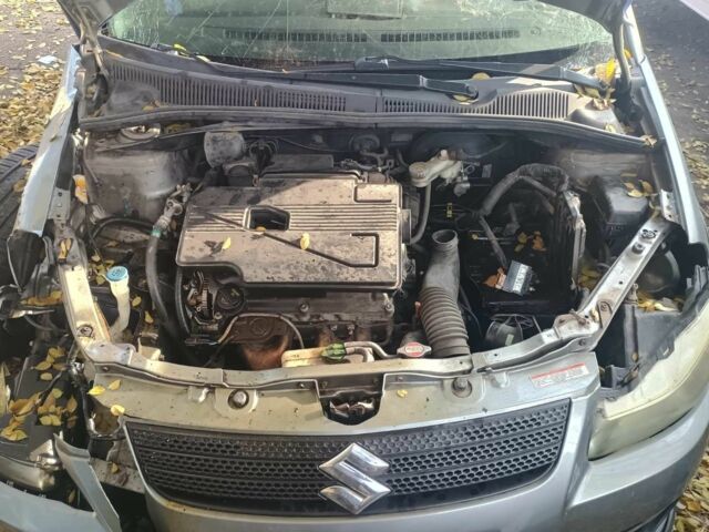 Серый Сузуки СХ4, объемом двигателя 1.6 л и пробегом 200 тыс. км за 1500 $, фото 1 на Automoto.ua