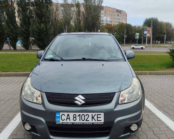 Серый Сузуки СХ4, объемом двигателя 1.59 л и пробегом 232 тыс. км за 6100 $, фото 1 на Automoto.ua