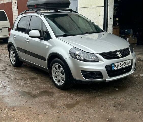 Серый Сузуки СХ4, объемом двигателя 1.6 л и пробегом 243 тыс. км за 7000 $, фото 1 на Automoto.ua