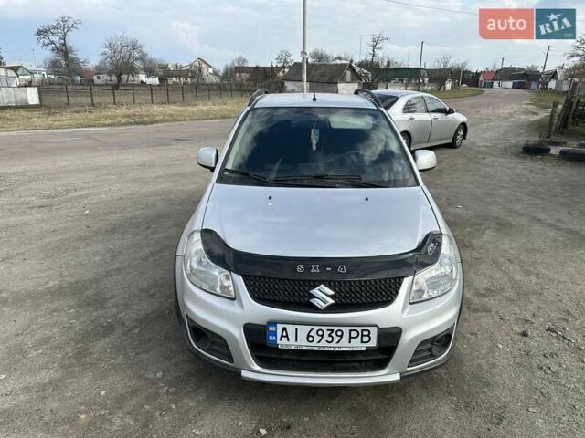 Серый Сузуки СХ4, объемом двигателя 1.6 л и пробегом 150 тыс. км за 8000 $, фото 1 на Automoto.ua