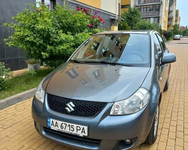 Серый Сузуки СХ4, объемом двигателя 1.59 л и пробегом 250 тыс. км за 5500 $, фото 1 на Automoto.ua