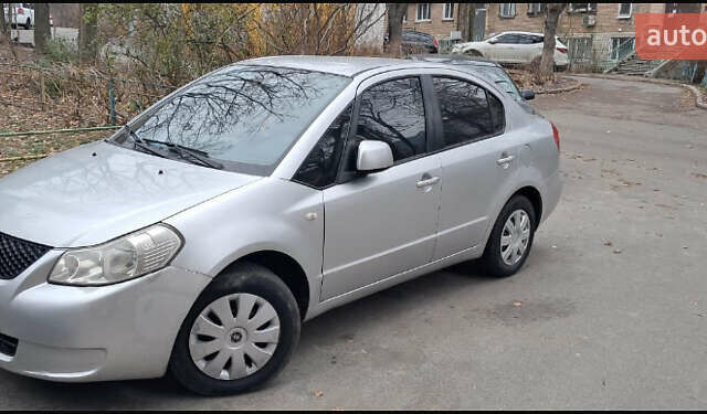 Серый Сузуки СХ4, объемом двигателя 1.6 л и пробегом 261 тыс. км за 4000 $, фото 1 на Automoto.ua