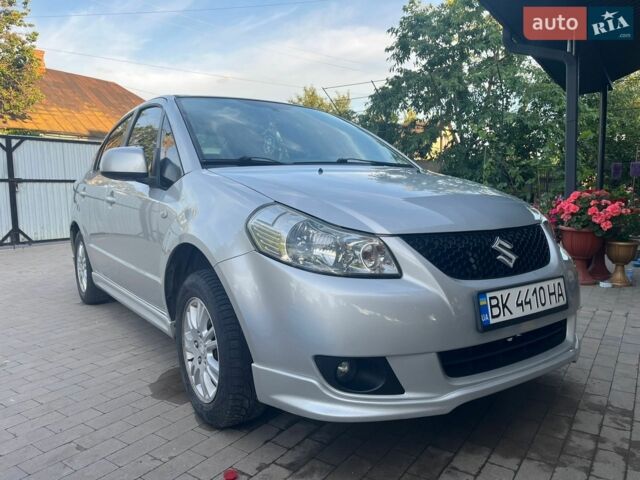 Серый Сузуки СХ4, объемом двигателя 1.59 л и пробегом 178 тыс. км за 6100 $, фото 1 на Automoto.ua