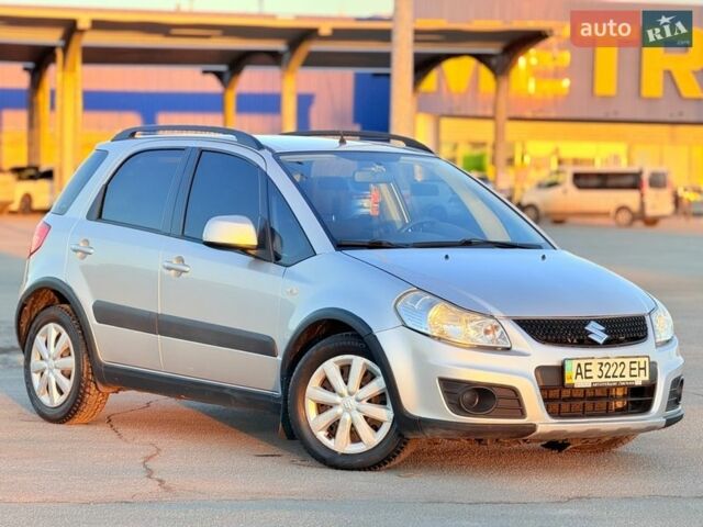 Серый Сузуки СХ4, объемом двигателя 1.59 л и пробегом 225 тыс. км за 7600 $, фото 1 на Automoto.ua