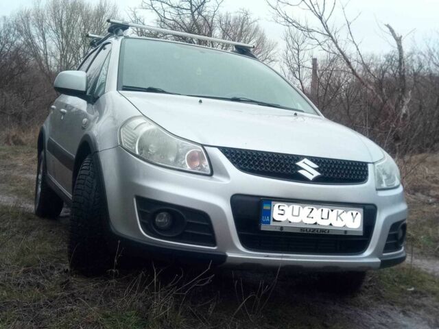 Сузуки СХ4 2013 в Светловдске на Automoto.ua Серый Сузуки СХ4, объемом двигателя 2 л и пробегом 164 тыс. км за 12500 $, фото 1 на Automoto.ua