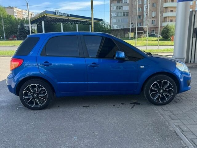 Синий Сузуки СХ4, объемом двигателя 1.6 л и пробегом 190 тыс. км за 6999 $, фото 1 на Automoto.ua