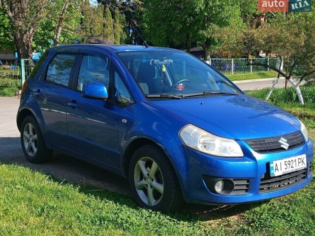 Синий Сузуки СХ4, объемом двигателя 1.59 л и пробегом 174 тыс. км за 3800 $, фото 1 на Automoto.ua