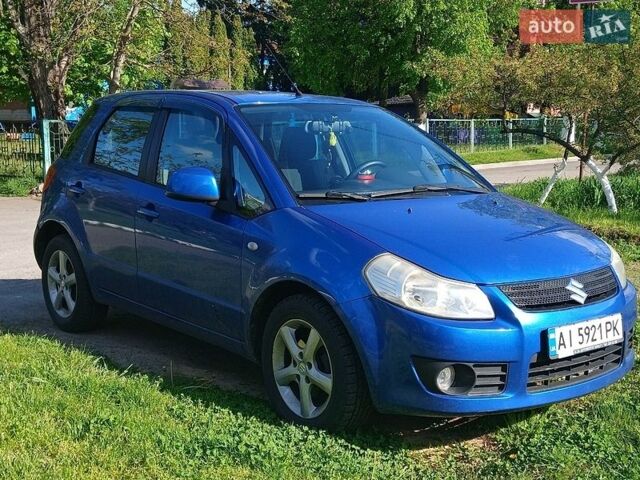 Синий Сузуки СХ4, объемом двигателя 1.59 л и пробегом 174 тыс. км за 4300 $, фото 1 на Automoto.ua