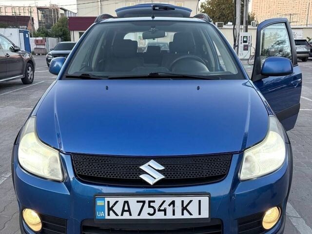 Синий Сузуки СХ4, объемом двигателя 1.59 л и пробегом 280 тыс. км за 6250 $, фото 1 на Automoto.ua
