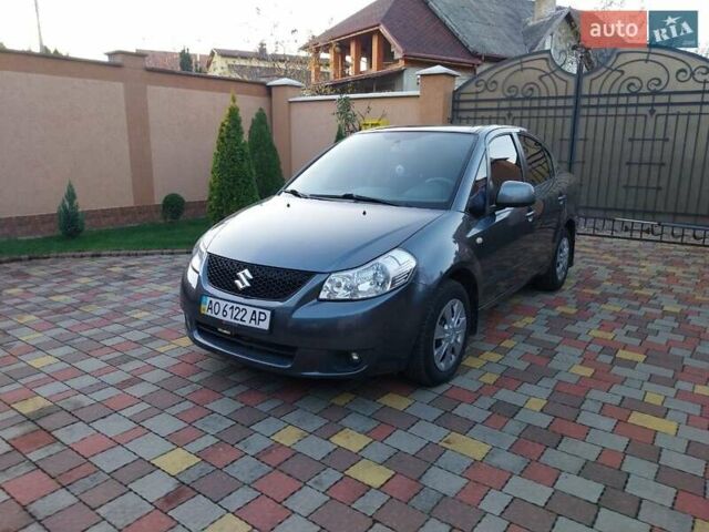 Синий Сузуки СХ4, объемом двигателя 1.59 л и пробегом 114 тыс. км за 4200 $, фото 1 на Automoto.ua