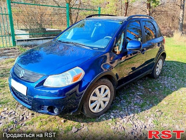 Синий Сузуки СХ4, объемом двигателя 2 л и пробегом 142 тыс. км за 6999 $, фото 1 на Automoto.ua
