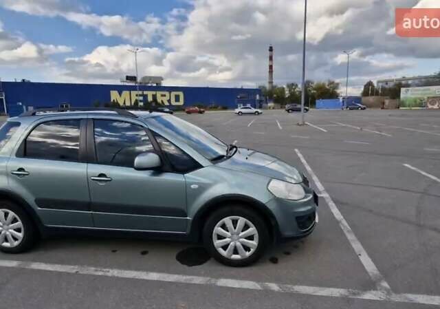 Сузуки СХ4 2012 в Днепре (Днепропетровске) на Automoto.ua Зеленый Сузуки СХ4, объемом двигателя 1.6 л и пробегом 69 тыс. км за 11000 $, фото 1 на Automoto.ua