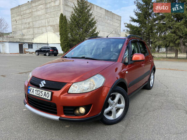 Оранжевый Сузуки СХ4, объемом двигателя 1.6 л и пробегом 215 тыс. км за 7300 $, фото 1 на Automoto.ua