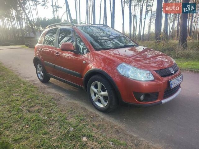 Оранжевый Сузуки СХ4, объемом двигателя 1.6 л и пробегом 202 тыс. км за 6100 $, фото 1 на Automoto.ua