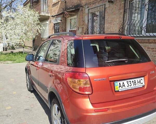 Оранжевый Сузуки СХ4, объемом двигателя 1.59 л и пробегом 172 тыс. км за 7600 $, фото 1 на Automoto.ua