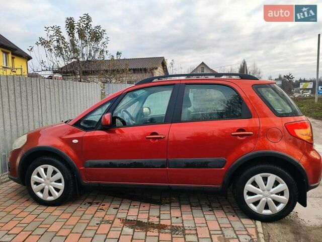 Оранжевый Сузуки СХ4, объемом двигателя 1.59 л и пробегом 92 тыс. км за 7000 $, фото 1 на Automoto.ua