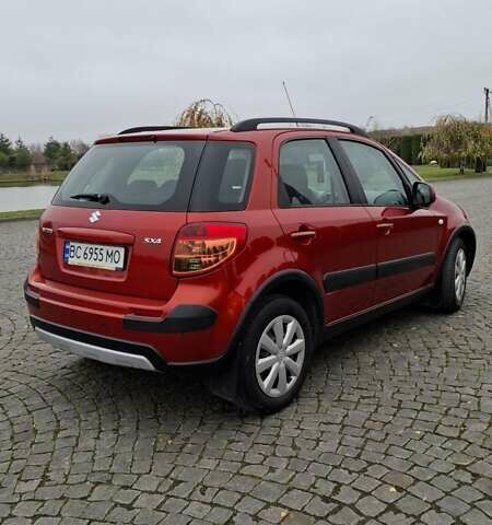 Оранжевый Сузуки СХ4, объемом двигателя 1.6 л и пробегом 85 тыс. км за 11200 $, фото 1 на Automoto.ua