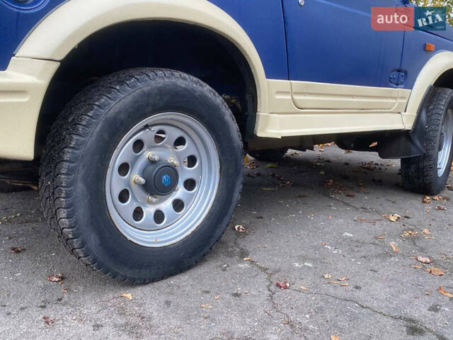 Синий Сузуки Самурай, объемом двигателя 1.9 л и пробегом 285 тыс. км за 8000 $, фото 1 на Automoto.ua