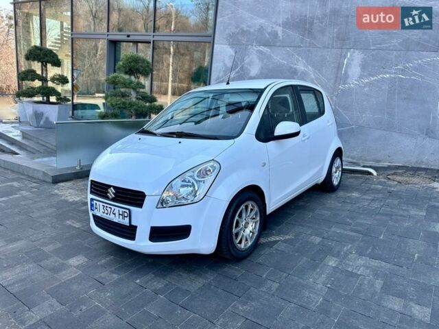 Белый Сузуки Сплеш, объемом двигателя 1.24 л и пробегом 74 тыс. км за 8000 $, фото 1 на Automoto.ua
