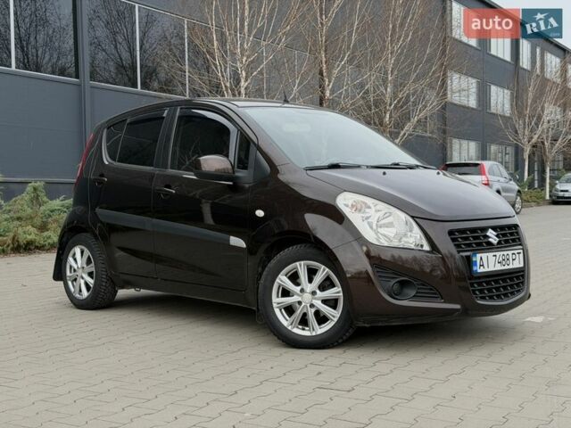 Коричневый Сузуки Сплеш, объемом двигателя 1.24 л и пробегом 59 тыс. км за 9900 $, фото 1 на Automoto.ua