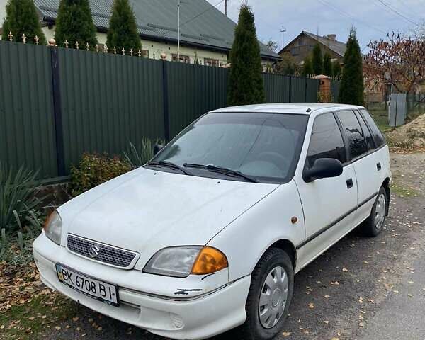 Белый Сузуки Свифт, объемом двигателя 1.3 л и пробегом 125 тыс. км за 1000 $, фото 1 на Automoto.ua