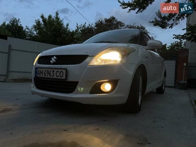 Білий Сузукі Свифт, об'ємом двигуна 1.25 л та пробігом 223 тис. км за 6700 $, фото 1 на Automoto.ua