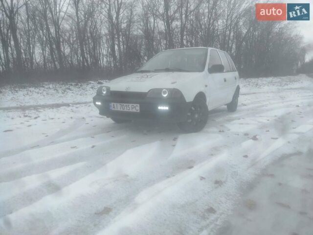 Білий Сузукі Свифт, об'ємом двигуна 1.3 л та пробігом 350 тис. км за 2000 $, фото 1 на Automoto.ua