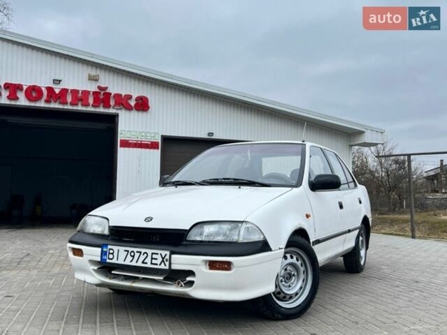 Белый Сузуки Свифт, объемом двигателя 1.6 л и пробегом 150 тыс. км за 1200 $, фото 1 на Automoto.ua