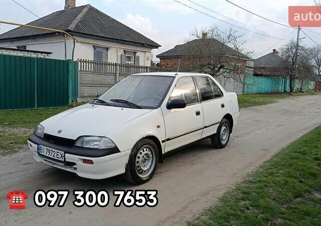 Белый Сузуки Свифт, объемом двигателя 1.59 л и пробегом 150 тыс. км за 1150 $, фото 1 на Automoto.ua