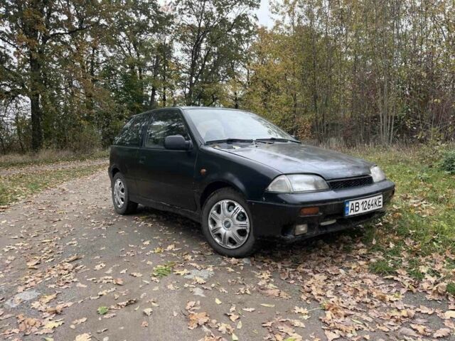 Чорний Сузукі Свифт, об'ємом двигуна 1.3 л та пробігом 320 тис. км за 500 $, фото 1 на Automoto.ua