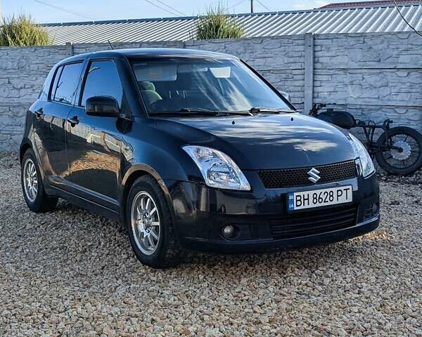 Черный Сузуки Свифт, объемом двигателя 1.49 л и пробегом 145 тыс. км за 5200 $, фото 1 на Automoto.ua