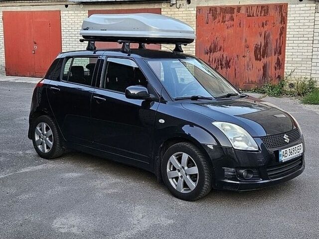Чорний Сузукі Свифт, об'ємом двигуна 1 л та пробігом 165 тис. км за 5138 $, фото 1 на Automoto.ua