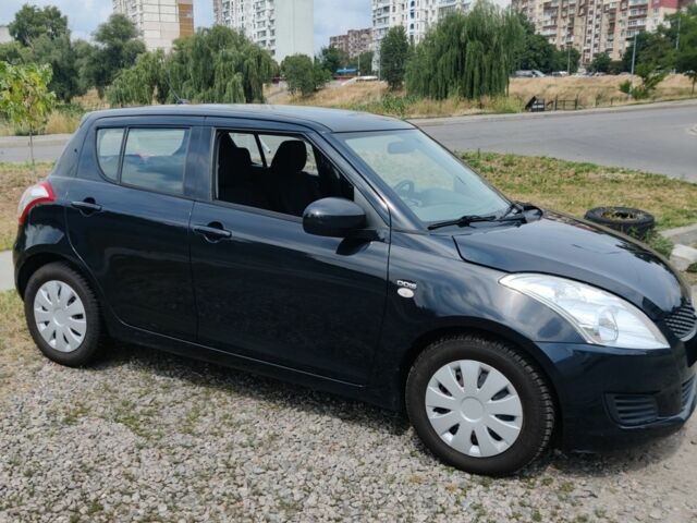 Чорний Сузукі Свифт, об'ємом двигуна 1.3 л та пробігом 184 тис. км за 5796 $, фото 1 на Automoto.ua