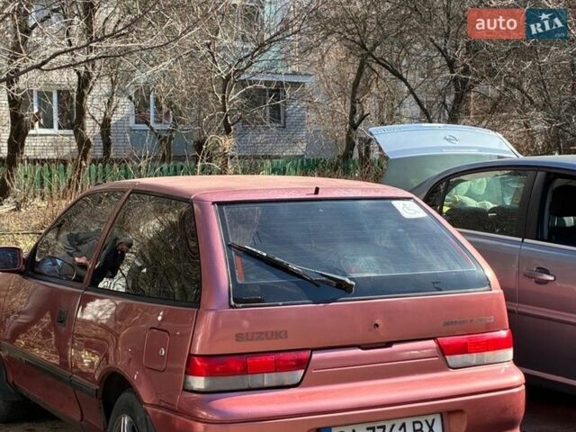 Червоний Сузукі Свифт, об'ємом двигуна 0.99 л та пробігом 100 тис. км за 1300 $, фото 1 на Automoto.ua