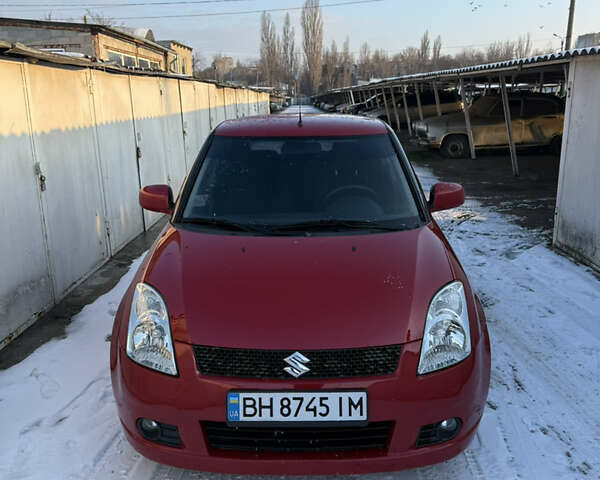 Червоний Сузукі Свифт, об'ємом двигуна 1.33 л та пробігом 147 тис. км за 4400 $, фото 1 на Automoto.ua