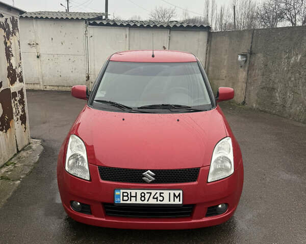Красный Сузуки Свифт, объемом двигателя 1.33 л и пробегом 147 тыс. км за 4900 $, фото 1 на Automoto.ua