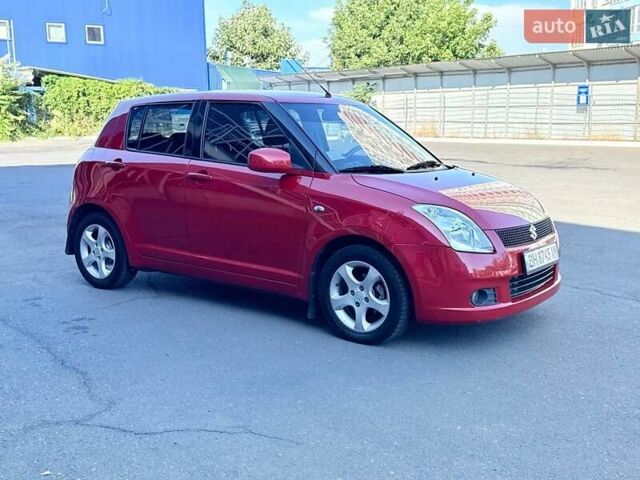 Красный Сузуки Свифт, объемом двигателя 1.33 л и пробегом 147 тыс. км за 4200 $, фото 1 на Automoto.ua