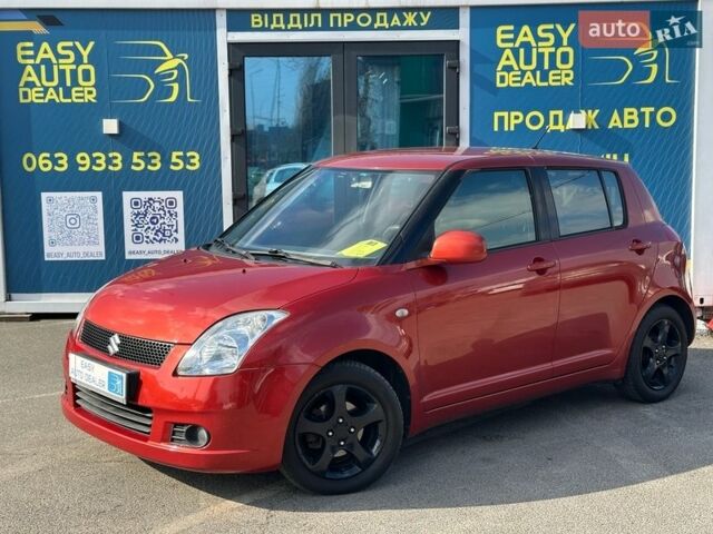 Красный Сузуки Свифт, объемом двигателя 1.49 л и пробегом 205 тыс. км за 6290 $, фото 1 на Automoto.ua