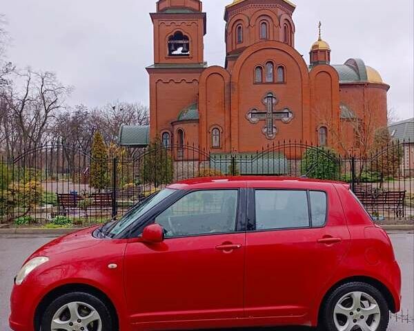 Красный Сузуки Свифт, объемом двигателя 1.49 л и пробегом 306 тыс. км за 6500 $, фото 1 на Automoto.ua