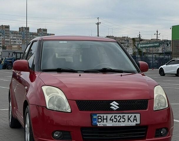 Червоний Сузукі Свифт, об'ємом двигуна 1.49 л та пробігом 201 тис. км за 5300 $, фото 1 на Automoto.ua
