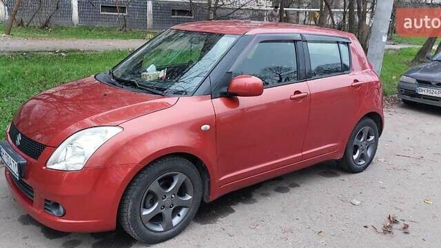 Красный Сузуки Свифт, объемом двигателя 1.49 л и пробегом 168 тыс. км за 7300 $, фото 1 на Automoto.ua