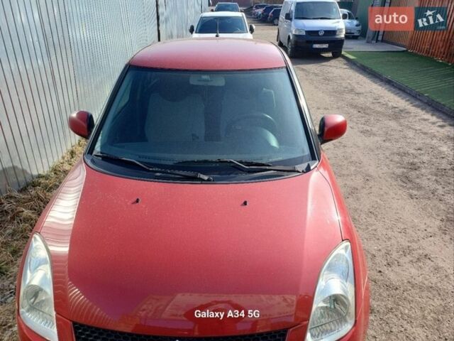 Красный Сузуки Свифт, объемом двигателя 1.5 л и пробегом 235 тыс. км за 6300 $, фото 1 на Automoto.ua