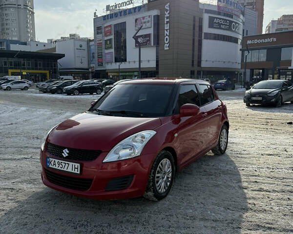 Червоний Сузукі Свифт, об'ємом двигуна 1.24 л та пробігом 145 тис. км за 8500 $, фото 1 на Automoto.ua