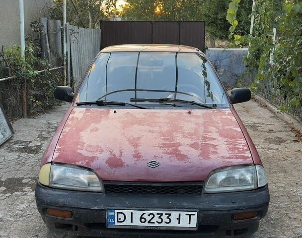 Красный Сузуки Свифт, объемом двигателя 1.6 л и пробегом 200 тыс. км за 500 $, фото 1 на Automoto.ua