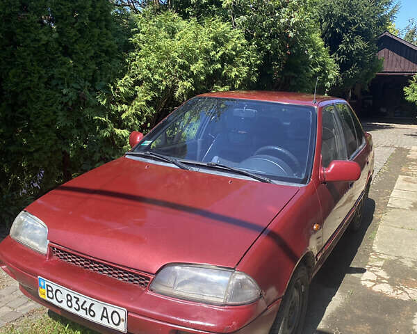 Красный Сузуки Свифт, объемом двигателя 1.3 л и пробегом 400 тыс. км за 950 $, фото 1 на Automoto.ua