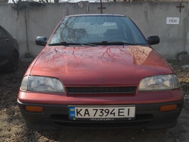 Красный Сузуки Свифт, объемом двигателя 1.3 л и пробегом 83 тыс. км за 1038 $, фото 1 на Automoto.ua
