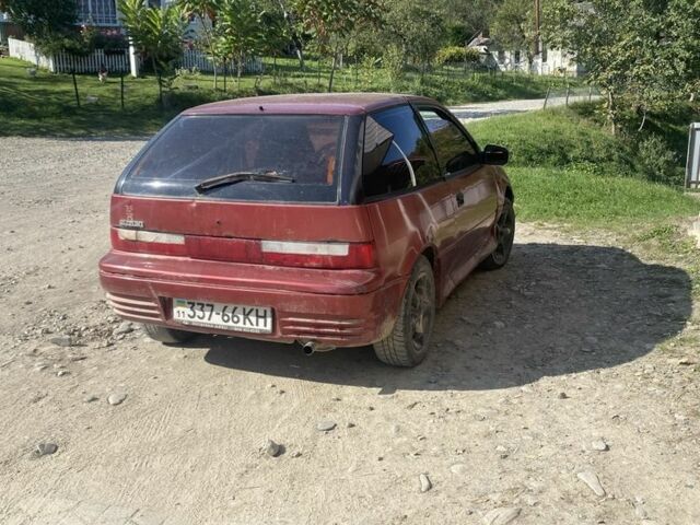Червоний Сузукі Свифт, об'ємом двигуна 1.3 л та пробігом 100 тис. км за 700 $, фото 1 на Automoto.ua