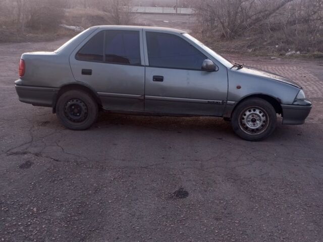 Сірий Сузукі Свифт, об'ємом двигуна 1.6 л та пробігом 300 тис. км за 1016 $, фото 1 на Automoto.ua